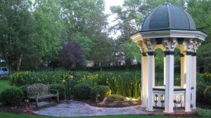 Gazebo at pond with lightscaping